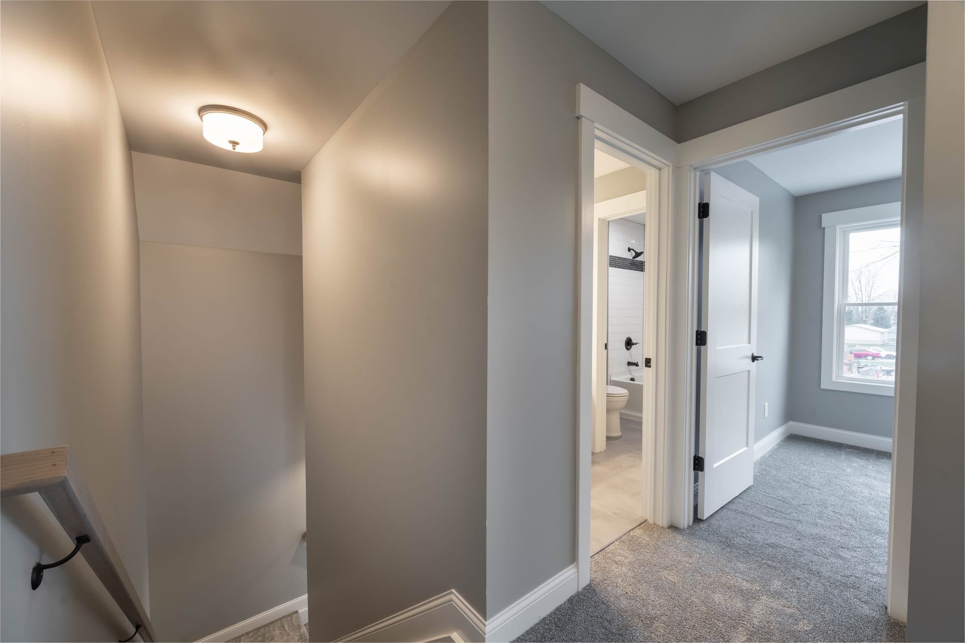 Master closet with built-in shelving in Alice residence