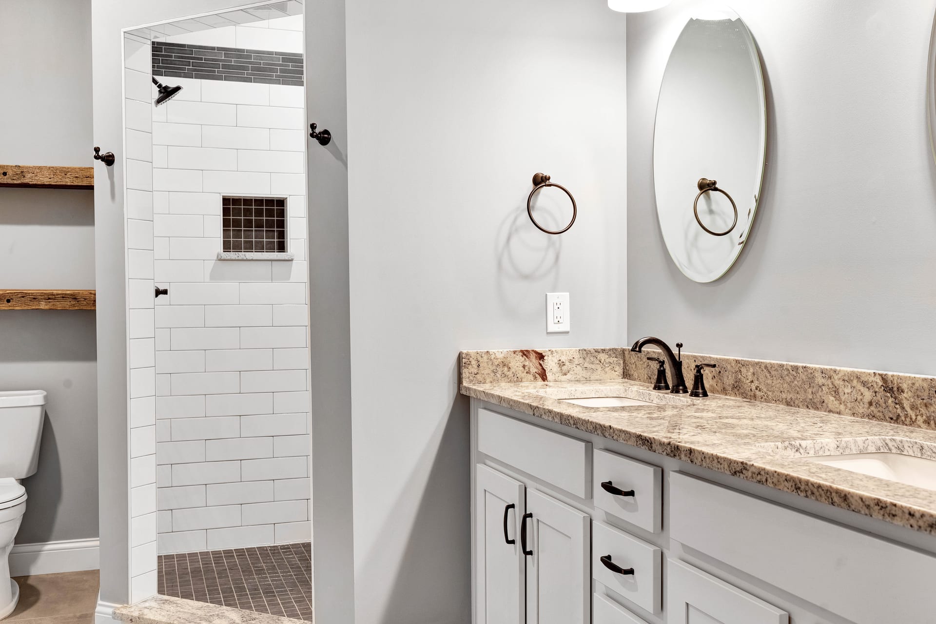 Mudroom with storage and bench in Alice residence