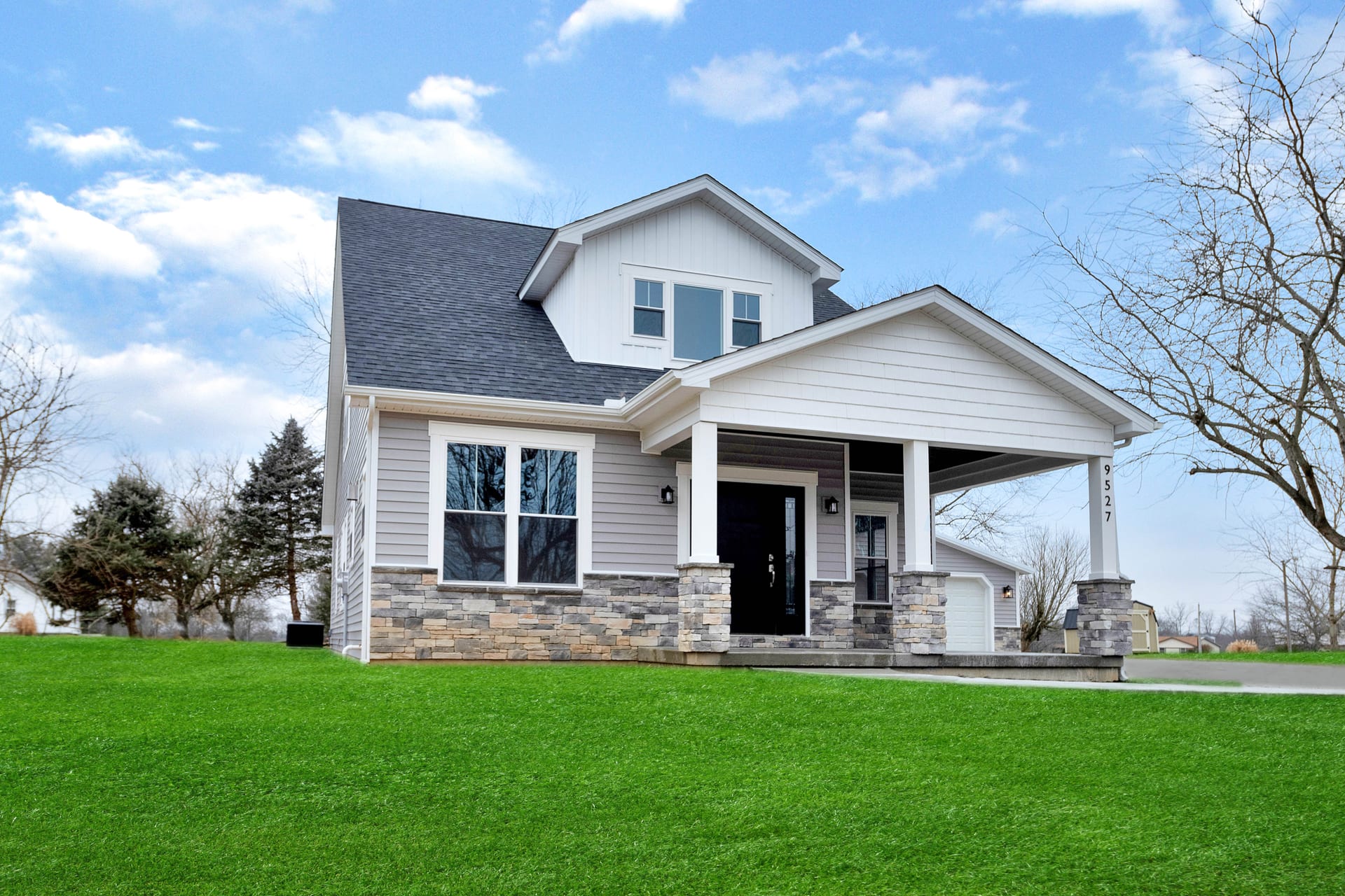 Rear elevation with landscaping at Alice custom home