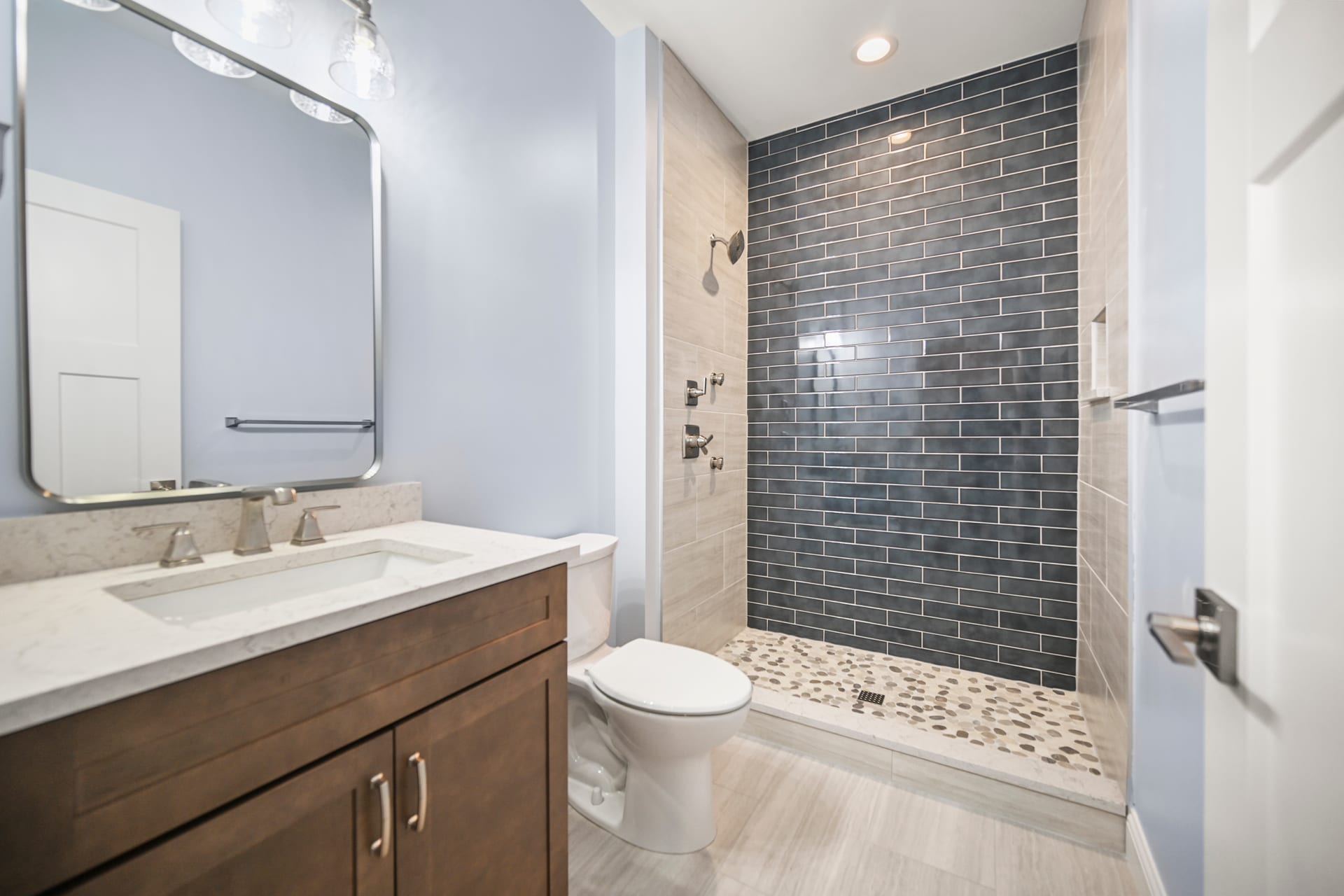 Master bathroom with soaking tub and tile surround