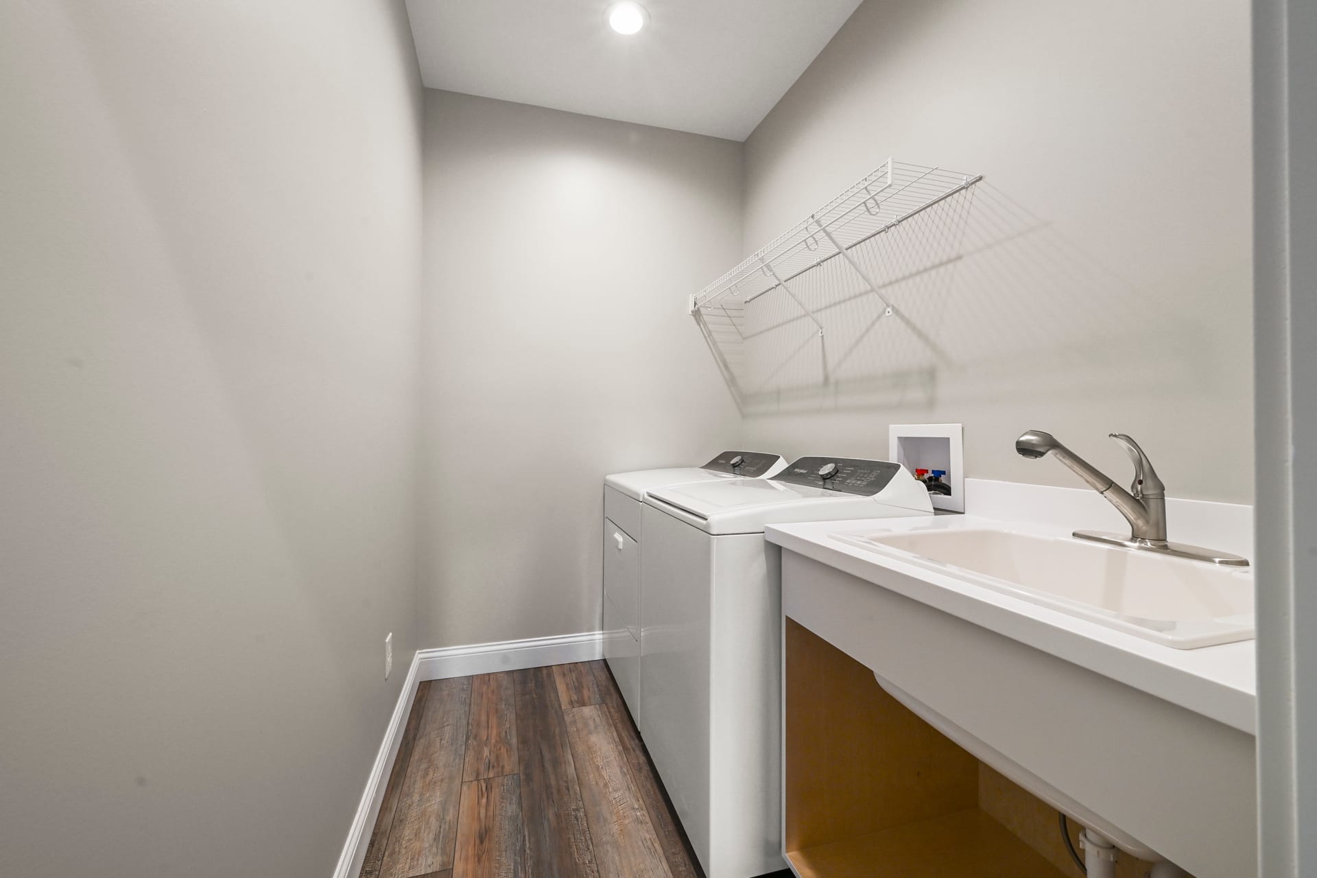Home office with built-in desk and shelving