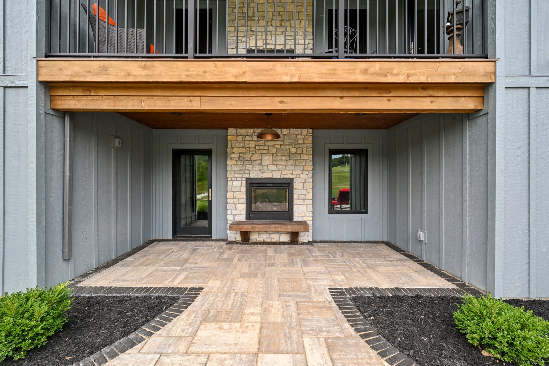 Final exterior with landscaping in completed Caudill custom home