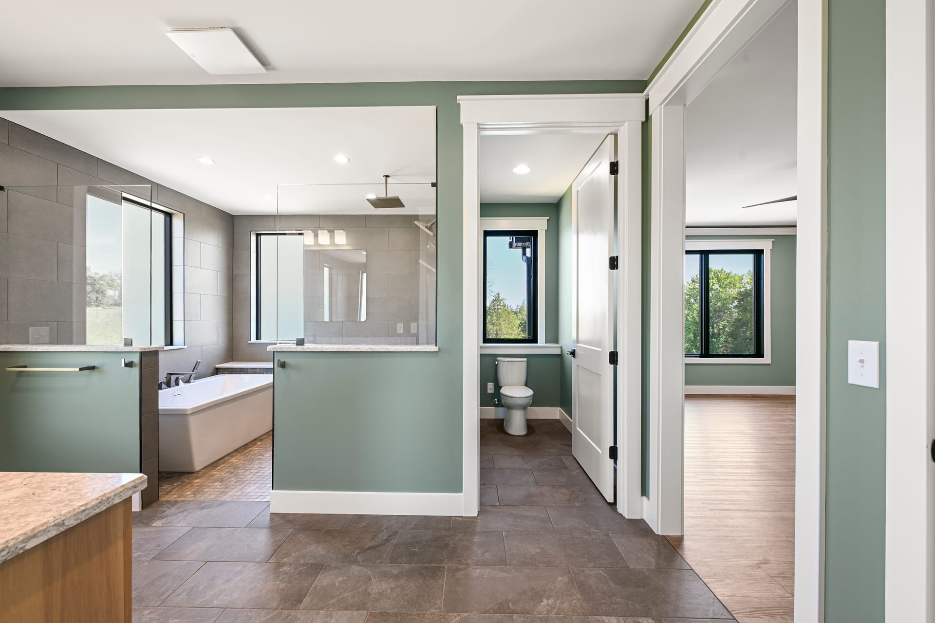 Updated guest bedroom in Drouge residence remodel